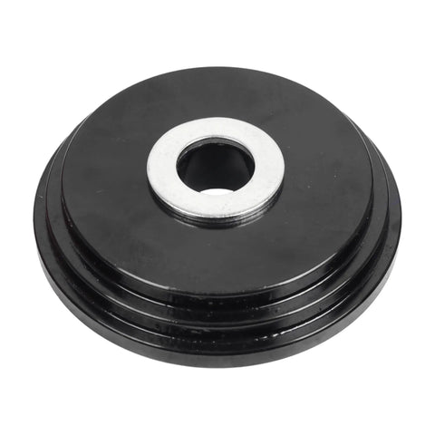 Close-up of a black metal plate from the Front Wheel Drive Bearing Adapters Puller Set 23 Piece Replacement Wheel Bearing Removal Tool Bushing Driver Kit