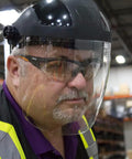 Man wearing DP4 Face Shield With Lightweight Build, High Impact Crown And Ratchet Headgear For Grinding And Cutting, ANSI Z87.1 Approved