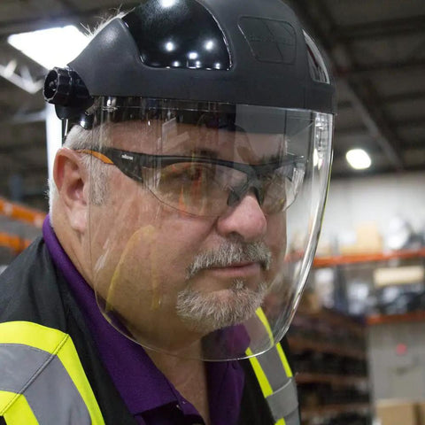Man wearing DP4 Face Shield With Lightweight Build, High Impact Crown And Ratchet Headgear For Grinding And Cutting, ANSI Z87.1 Approved
