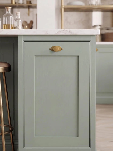 Premium Antique Brass Cabinet Knobs Paired With Elegant Oval Backplates 6 Pack on green cabinet drawer.