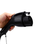 Plug And Play J1772 Level 1 Portable EV Charger Adjustable 6 To 16 Amps Weatherproof Electric Vehicle Plug Cord held in hand.