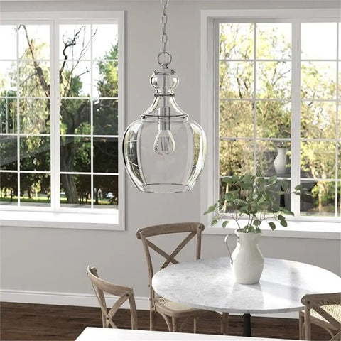 11-Inch Wide Pendant Light With Glass Shade In Brushed Nickel And Clear Finish above dining room table