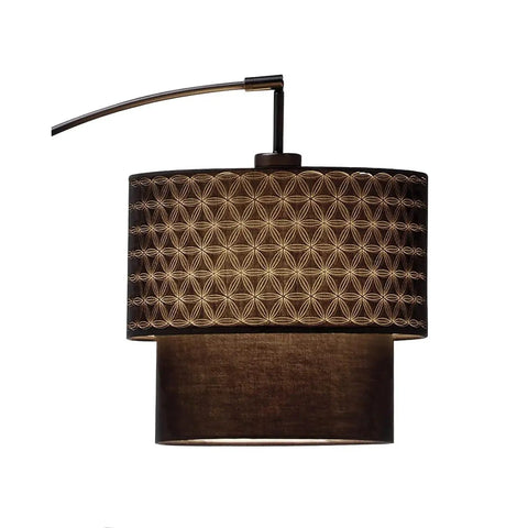 Gala Arc Floor Lamp In Black With Adjustable Arm, Double Kaleidoscope Fabric Shade glowing under soft lighting.