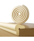 Foolproof Nbr Foam Edge Guards For Baby Proofing Living Space Plus Four Molded Corner Bumpers High Density Shock Absorbing Padding To Block Sharp Table Edges In Warm Beige, rolled foam and corner piece on wooden surface.