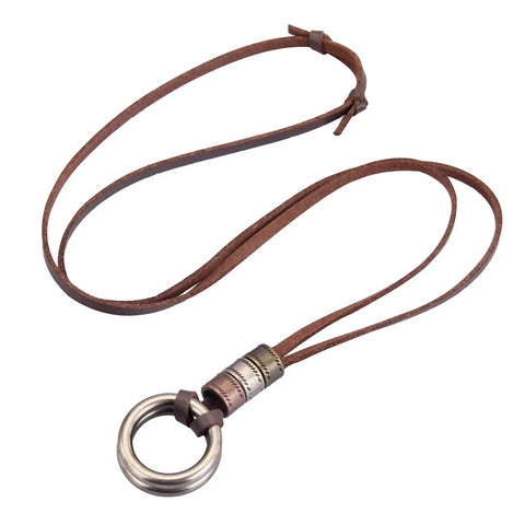 Top Shelf Handcrafted Leather Necklace For Men And Women Boasting A Fly Vintage Hippie Design With Adjustable Long Cord And Smooth Durable Alloy Cross Pendant In Classic Brown with a round metallic charm and brown strap.