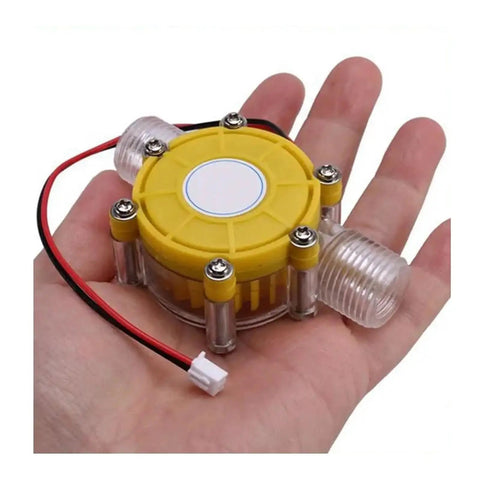 Hand holding Mini Hydroelectric Water Flow Generator Kit 12V Regulated Micro Type Three Piece Set For Small Water Flow And Faucet Power