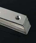 Heavy Duty Stainless Steel Corner Braces Built Like A Tank For Rock Solid Furniture Repair And Diy Fixes Comes In 4 Or 10 Piece Pack Measuring 120X120mm Workhorse Grade stacked in a neat arrangement on a black surface.