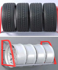 Heavy Duty Wall Mounted Tire Storage Rack For Garage Workshop Hella Solid Cold Rolled Steel Adjustable Multi Tire Organizer Holds Five Car Or Motorcycle Wheels With Mounting Kit Included displaying four tires and four rims.