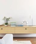 Wooden cabinet with 4 Piece Antique Cabinet Handles Set Vintage Drawer Knobs for Dresser and Closet, steering wheel style.