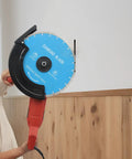 Beast 14 Inch Electric Concrete Saw With 3000W Motor And 4300 RPM for cutting concrete, shown in use on a wall