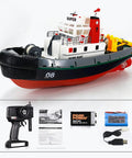 Massive 23.6 Inch Remote Control Fire Boat With Water Sprayer 60cm Electric RC Watercraft, accessories, and controller.