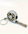 Hella Handy Keychain Tape Measure Boasting A Durable Steel Ruler Track And Totally Sick Wheel Hub Design For Pocket Ready Convenience When You Gotta Take Quick Measurements Right Now, 2M steel tape in chrome casing.