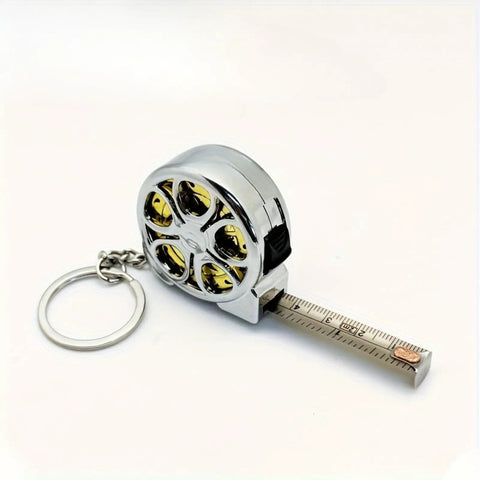 Hella Handy Keychain Tape Measure Boasting A Durable Steel Ruler Track And Totally Sick Wheel Hub Design For Pocket Ready Convenience When You Gotta Take Quick Measurements Right Now, 2M steel tape in chrome casing.