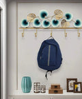 Slick Leaf Design Wall Mounted Coat Rack For Entryway Door with backpack hanging, featuring rust resistant metal hooks and leaf details.
