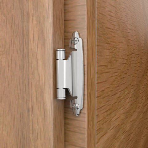 Chibery 3/8-inch inset cabinet hinge, brushed nickel, installed on a wood cabinet door; side view.