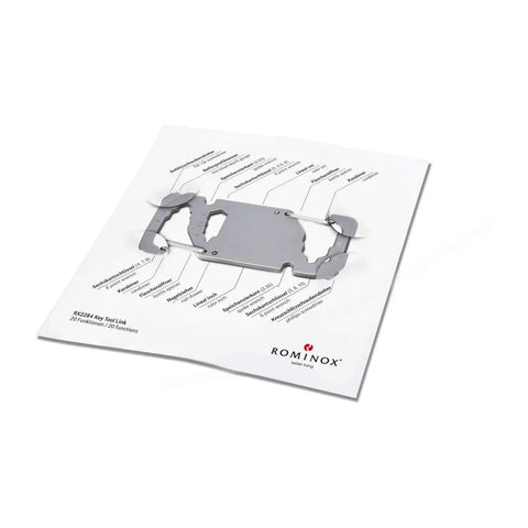 Stainless Steel Key Tool Multitool With 20 Functions on instruction sheet, including hex keys, and carabiner for travel keychain.