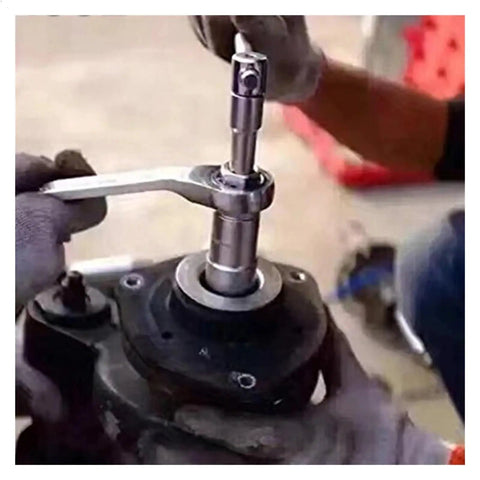 Mechanic using 18 Piece Hub Suspension Nut Removal Tool Socket Kit For Shock Absorber Struts on car suspension system