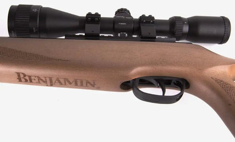Close-up of Trail XL Magnum 22 Caliber Break Barrel Air Rifle With Wood Stock And CenterPoint 3-9x40 Scope trigger and scope.