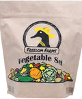 Brown paper packaging with illustrated vegetables, labeled 'Freedom Farms Vegetable Set'
