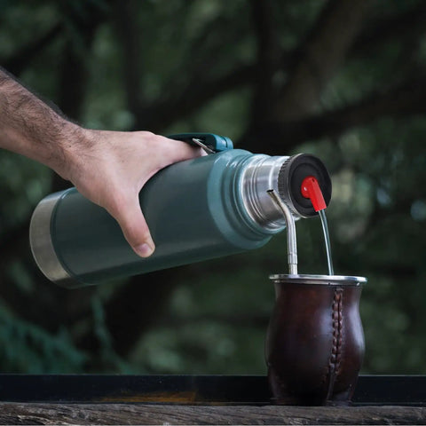 Person pouring liquid into mate cup using Thermal Flask Stopper Replacement For Yerba Mate Drinking Convert Your Thermos Into Yerba Mate Pico Mate Stopper With High Precision Flow Red On The Go For Camping And Travel.