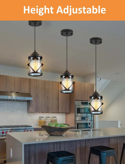 Black Pendant Lights For Kitchen Island With Glass Shades hanging over a kitchen island, highlighted for adjustable height.