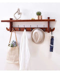 Heavy Duty Wall Mounted Coat Hooks Rack Combines Classic Vibe for Securing Coats Hats Jackets Keys Towels in Kitchen Closet Living Room, wooden shelf with five hooks.