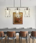 3 Light Clear Glass Cylinder Pendant Lights For Kitchen Island 33 Inch in dining room setting.
