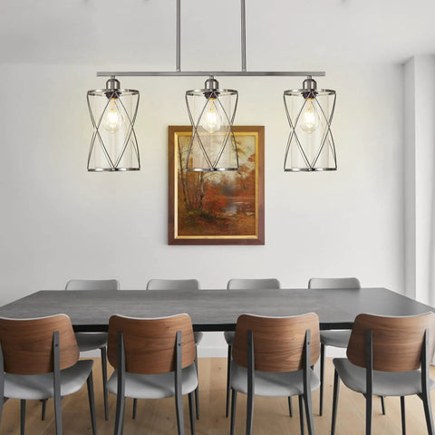 3 Light Clear Glass Cylinder Pendant Lights For Kitchen Island 33 Inch in dining room setting.