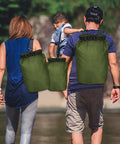 Family with Ultimate Five Pack Waterproof Dry Sack Set, Army Green, for kayaking, camping, and boating adventures