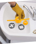 Person using Hardcore Pipe Threader Kit For Plumbing Projects High Performance Thread Maker Set on a bathroom sink.