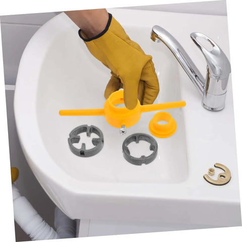 Person using Hardcore Pipe Threader Kit For Plumbing Projects High Performance Thread Maker Set on a bathroom sink.