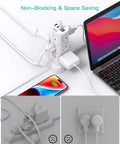 16 In 1 Surge Protector Power Strip Tower With Flat Plug, 12 AC Outlets And 4 USB Ports Including 2 USB C, 1080 Joules Protection, Integrated Circuit Breaker, Heavy Duty Power Hub For Home Office And Entertainment Center on desk with laptop and phone