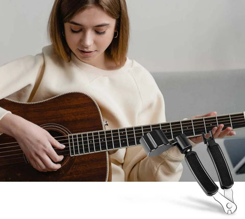 Guitar 3-in-1 maintenance tool (string winder, cutter, pin puller) by Amazon; black metal with textured grips, side view