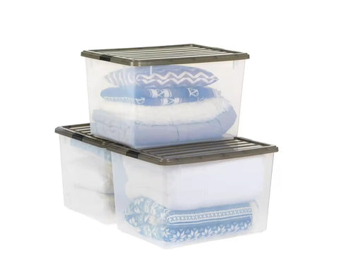 Big Ticket Clear Storage Bins 144 Quart 3 Pack Stackable Containers With Snappy Buckles Grooved Lid Handles Every Heavy Haul For Zero Drama Household Organization filled with blankets.