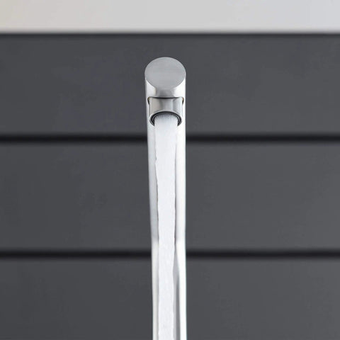Clean Lines Single Handle Pull Out Kitchen Faucet With Laminar Spray Led Knobs For Chilled Sparkling Water Butter Smooth Pour 180 Swivel Spout close-up of faucet nozzle showing sleek finish and water flow.