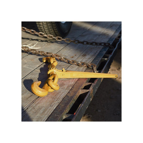 Heavy Duty Ratchet Load Binder For 3/8 To 1/2 Inch Grade 70 Transport Chain, shown on flatbed with yellow finish.