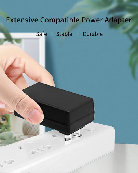 Heavy Duty 12V 3A Power Adaptor Charger With 11 Interchangeable DC Plugs, Regulated Switching Supply, 100-240V Input, 36W Output, Perfect For 0.1A To 3A Gear, black power adapter plugged into a wall outlet