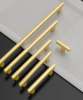 10 Pack 5 Inch Brushed Gold Cabinet Handles For Kitchen Cabinets And Drawers arranged on tabletop