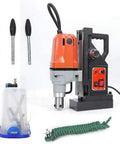 Kickass 1100W Magnetic Drill Press with attachments and controls for efficient metal hole drilling and cutter tapping.