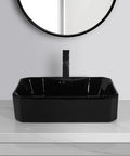 USZWBY Vessel Sinks Bathroom Vessel Sink with Faucet Hole Ceramic Wash Basin Hotel Apartment Creative Art Above Counter Bathroom Bowl Sink in black ceramic on a marble countertop.