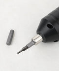 Knockout 4 Pack 1/4 Inch To 4mm Hex Screwdriver Bit Adapter With Solid Magnet and Plug And Play Design for Heavy Power Tools and Tight Garage Builds Ready To Roll No Sweat Setup, close-up of adapter in tool.