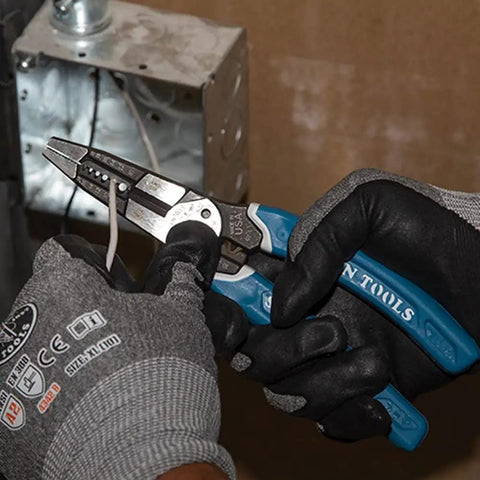Wire Stripper Cutter Crimper Tool For 8 To 18 AWG Solid And 10 To 20 AWG Stranded Wire being used by electrician.