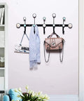 Round Dot Wrought Iron Wall Hook Absolute Game Changer For Entryway Storage That Slays Your Foyer Decor Keeps Coats Hats Keys And Bags Organized Straight Up A Real Winner with scarves and bags hanging.