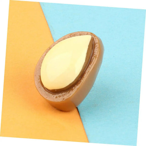 Close-up of a single miniature nut model from 20 Pieces Miniature Nut Models For Dollhouse Decor And Resin Crafts Realistic Tiny Food Props.