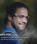 Man wearing All-Day Comfort Anti-Fog Safety Glasses With 99% UV Blocking, Scratch-Resistant Lenses, Z87.1 Eye Protection outdoors.