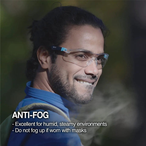 Man wearing All-Day Comfort Anti-Fog Safety Glasses With 99% UV Blocking, Scratch-Resistant Lenses, Z87.1 Eye Protection outdoors.