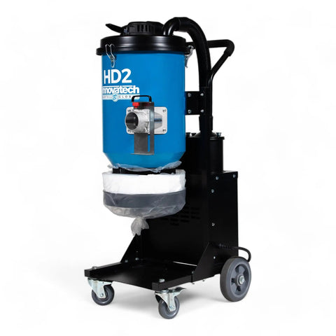 HD2 Two Motor HEPA Dust Collector With Reverse Air Jet Pulse Filter Cleaning System And Hella Powerful Dual Motors For Crushing Sawdust In Your Favorite Workshop Or Weekend Garage Built Solid As Nails In The Usa with blue container and cart.