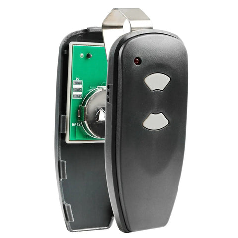 Open view of Marantec M3 2312 315 MHz Two Button Remote With Programming Pin For Garage Door Opener showing circuit board and buttons.