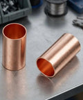 Get Your Hands On 250 Pcs Copper Tube Butt Wire Ferrules With Assorted Sizes From One To Six Millimeter For Crimping Electrical Wiring Terminals In Cars Trucks And Industrial Machinery Kits Stored Neatly. 2 copper butt ferrules on workbench