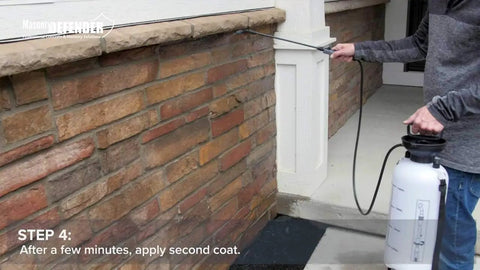 Person applying All Purpose Outdoor Masonry Sealer For Brick Stone And Concrete Clear Penetrating Waterproof Sealant That Creates A Deep Weatherproof Barrier And Keeps Water Out On Exterior Surfaces 1 Gallon to brick wall using a spray applicator.